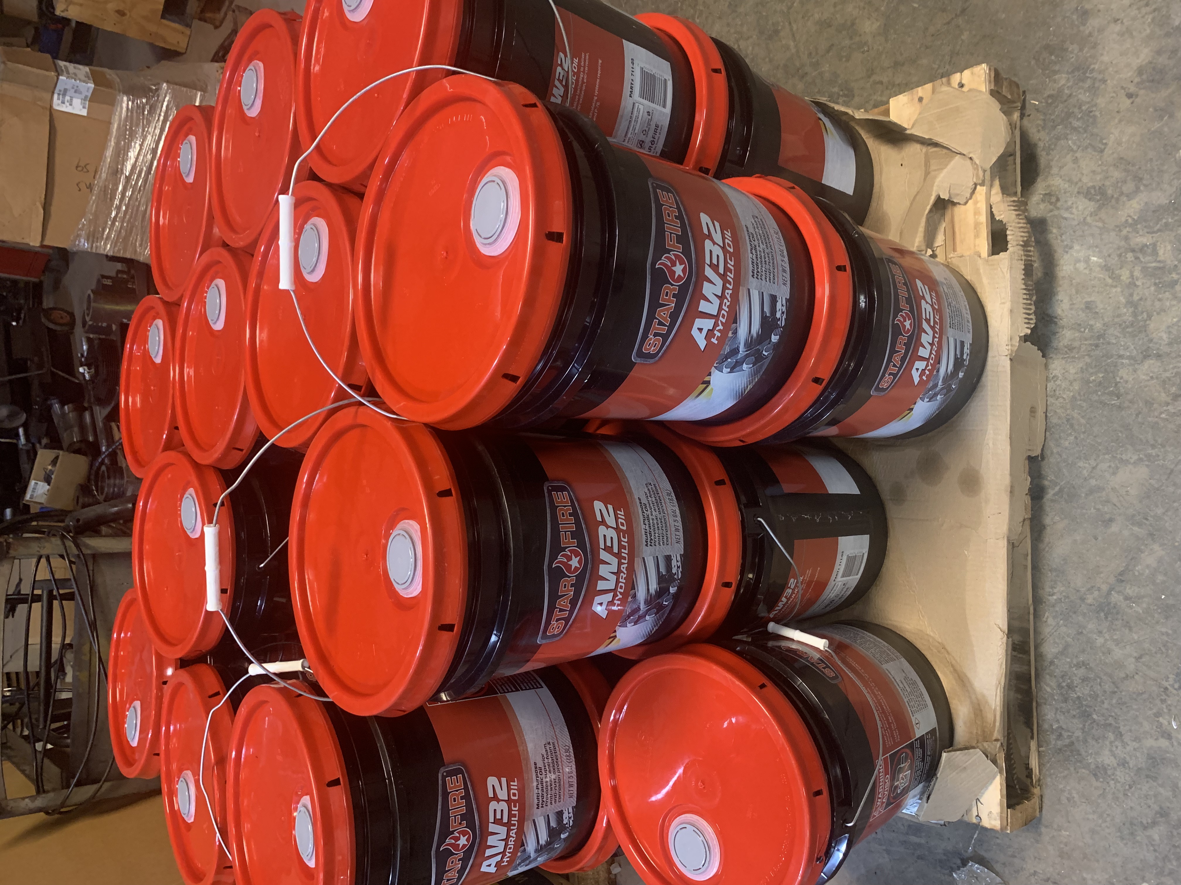 Large pallet stock of hydraulic fluid products in warehouse